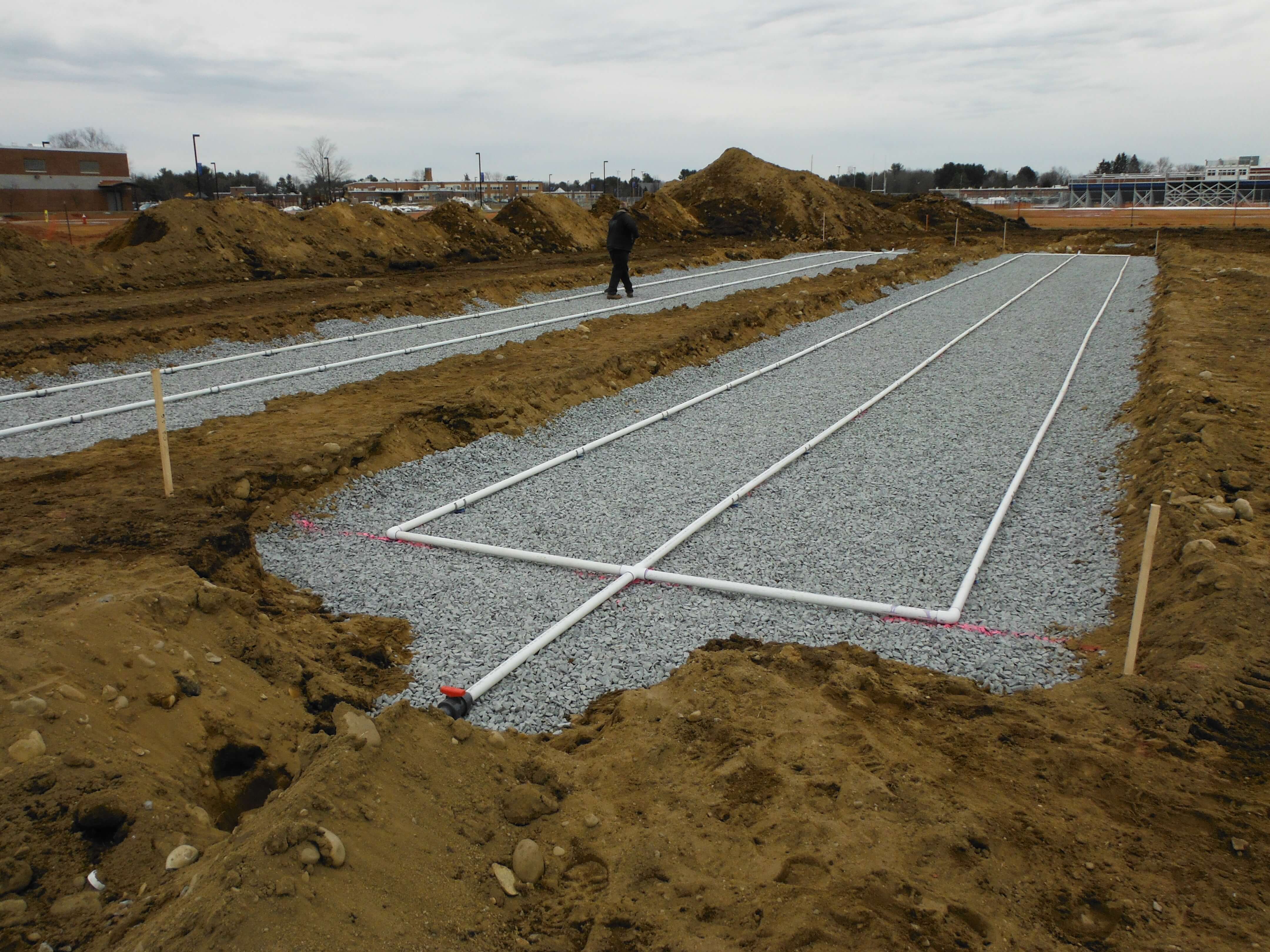 site work division - white pipes laid down